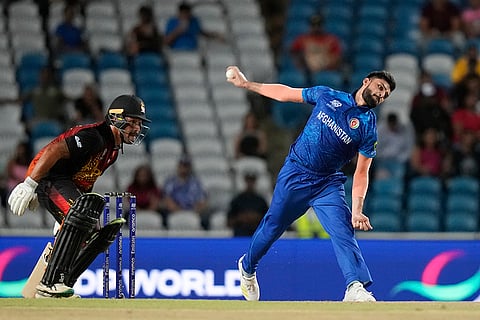 Naveen-ul-Haq bowls against PNG